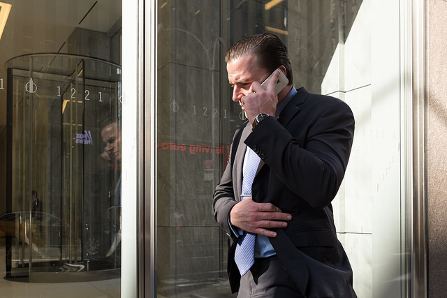 Business man using his phone