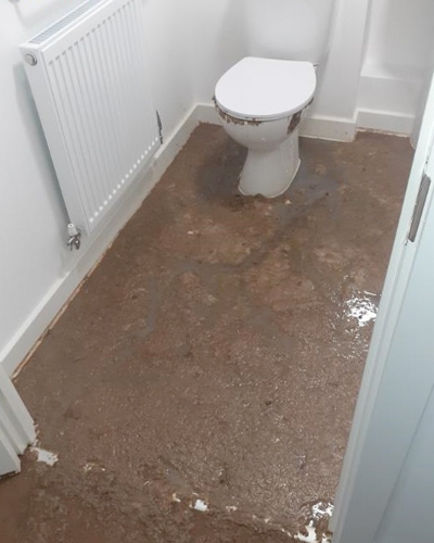 flooded bathroom - sewage - before